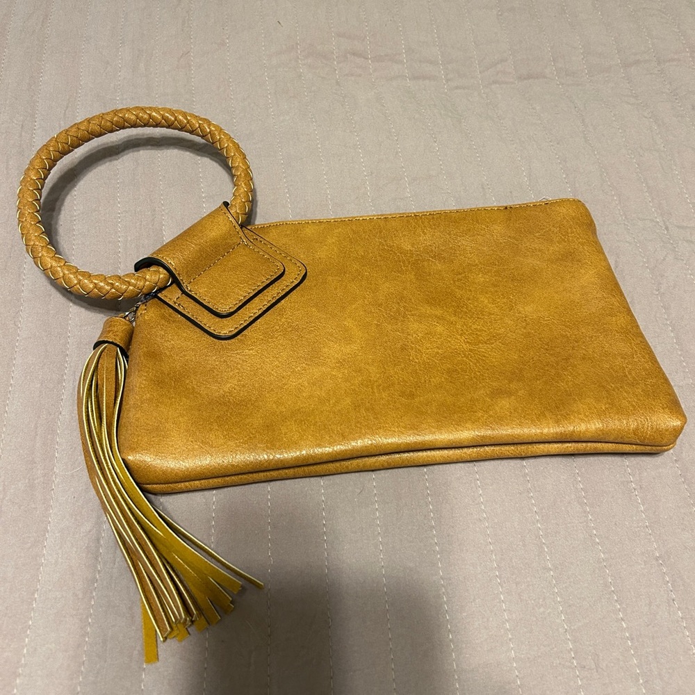 EUC tan clutch